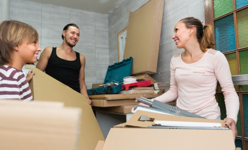 Removal team preparing a Bedfordpark home move with packed boxes and furniture