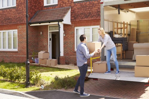 Bedfordpark home moving team preparing household items for loading