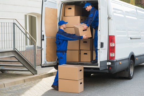 Local Bedfordpark moving van handling furniture and boxes