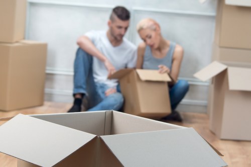 Professional movers handling furniture in a Bedfordpark property