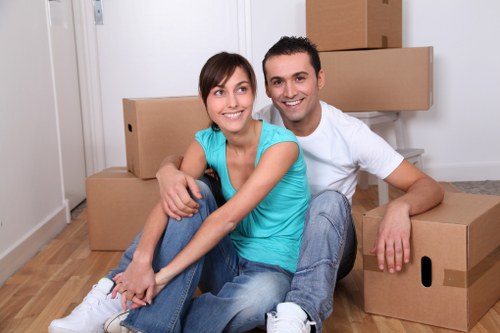 Loading household items into a van for a Bedfordpark removal