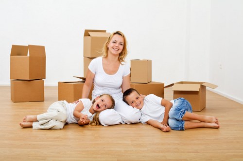 Moving team handling office equipment in a Bedfordpark commercial property
