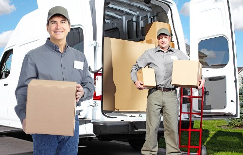Packed boxes and furniture prepared for a local relocation in Bedfordpark