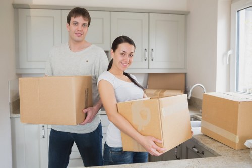 Office relocation equipment and boxed items prepared for transport in Bedfordpark